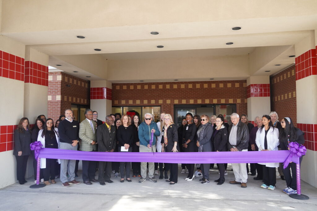 group photo - McGee’s Crossroads Location Reopens